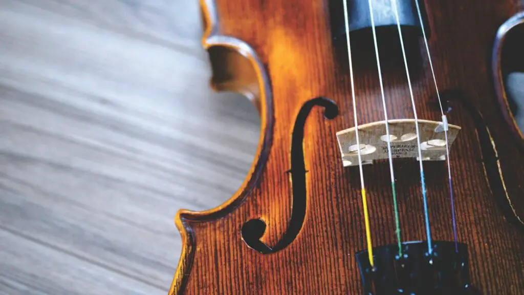 Violin on wooden planks